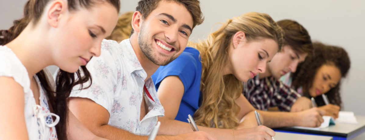 students-in-classroom-writing-2-1200x460